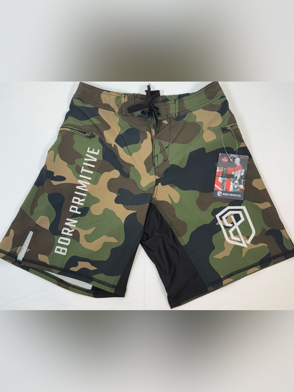 BNWT Born Primitive Men’s American Defender training shorts in a woodland camo